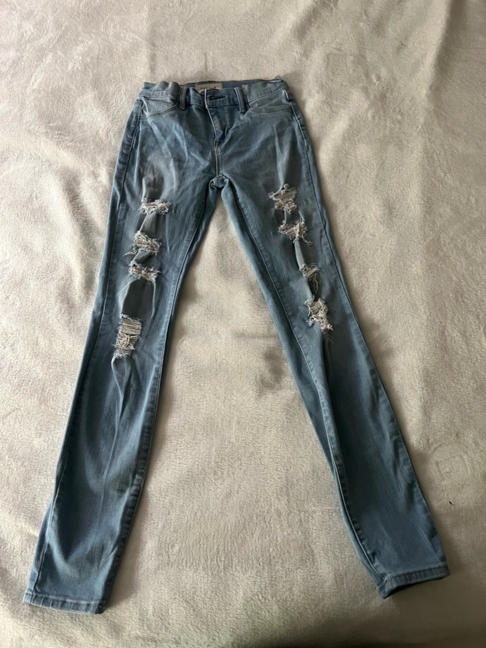 PacSun Faded Blue Ripped Skinny Jeggings
